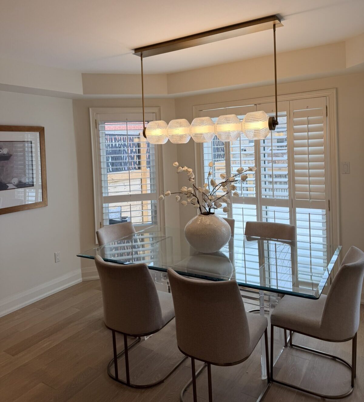 Modern dining room light fixture installation in Vaughan home