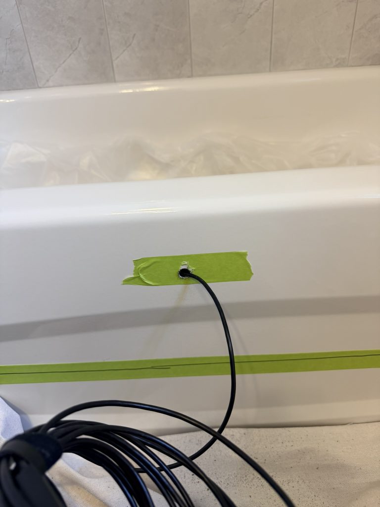 Borescope inspection inside a steel bathtub before a bathtub cutout installation in Toronto Title